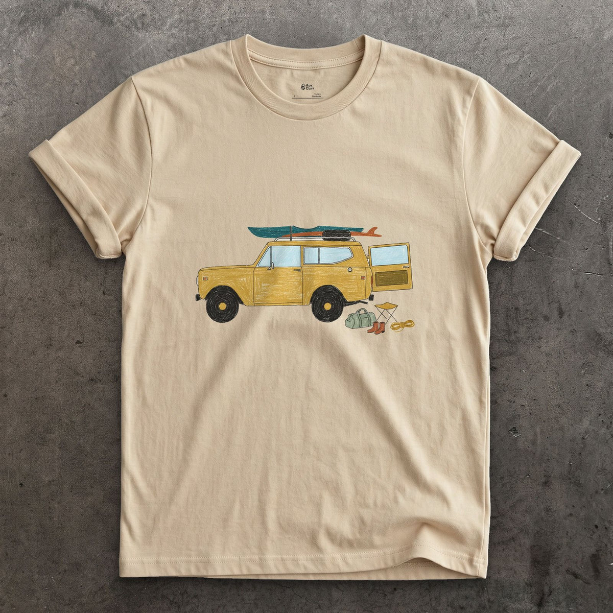 Wagon Loaded for a Put-In Before Sunrise design on a Sand Gildan Softstyle t-shirt