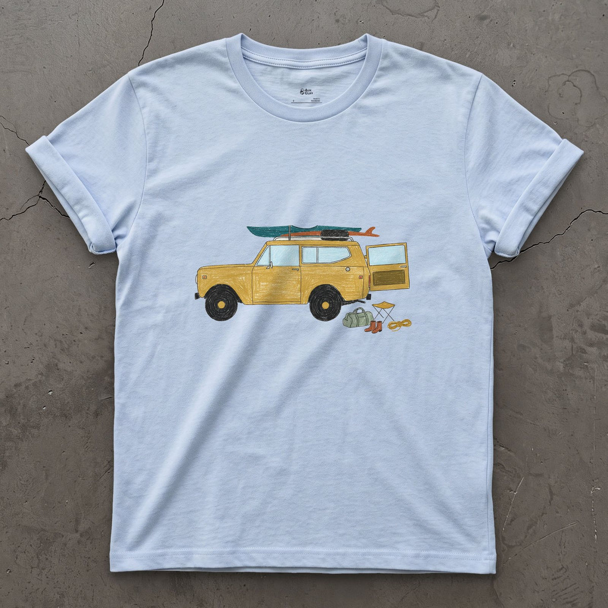 Wagon Loaded for a Put-In Before Sunrise design on a Light Blue Gildan Softstyle t-shirt