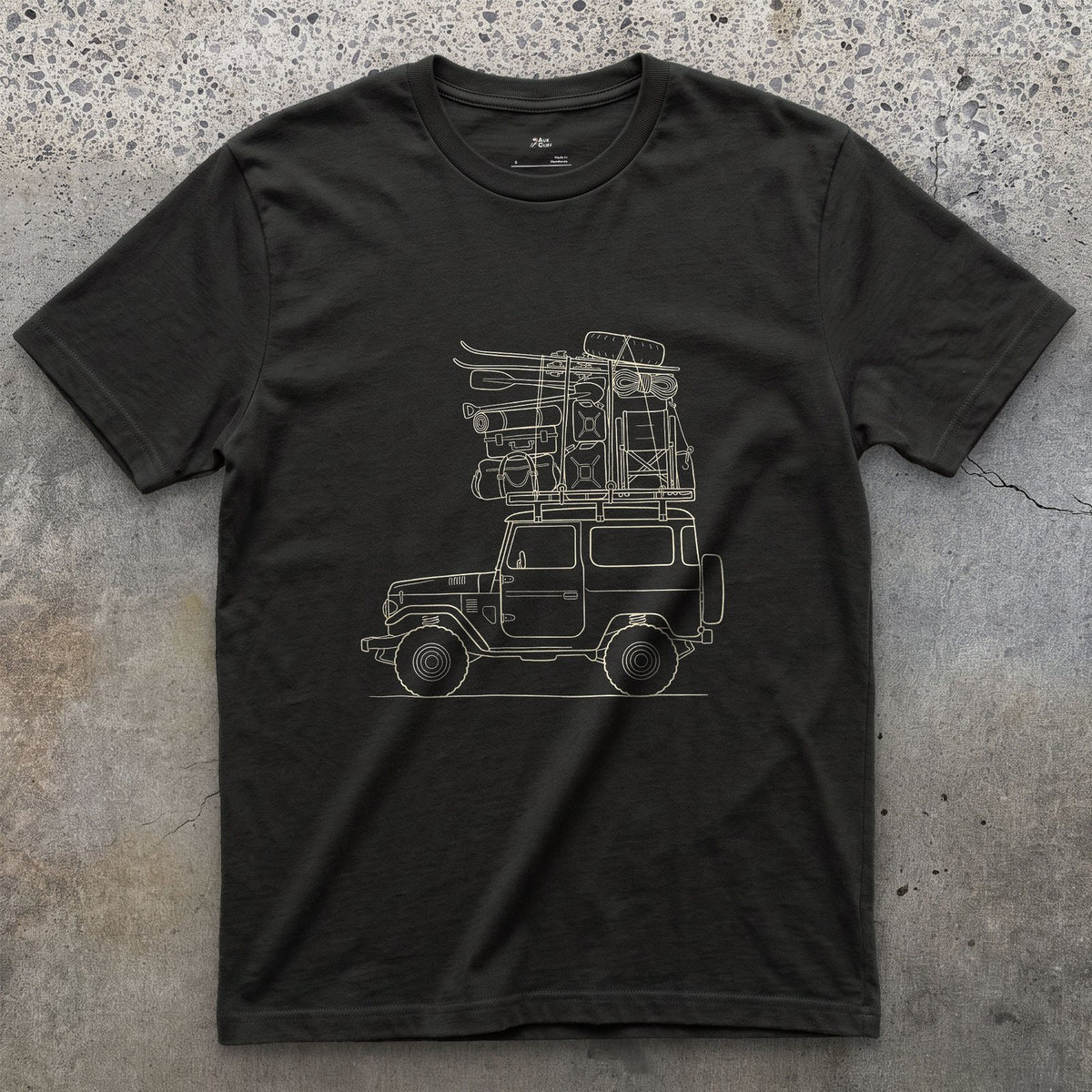 Every Bag Strapped Down on the Wagon design on a Black Gildan Softstyle t-shirt