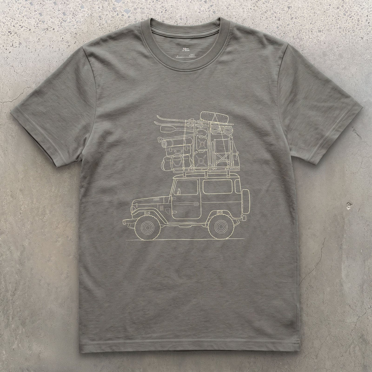 Every Bag Strapped Down on the Wagon design on a Charcoal Gildan Softstyle t-shirt