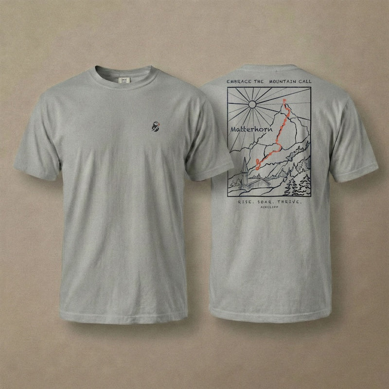 AukCliff Matterhorn tee in Grey, hand-drawn ridgeline line art across the back