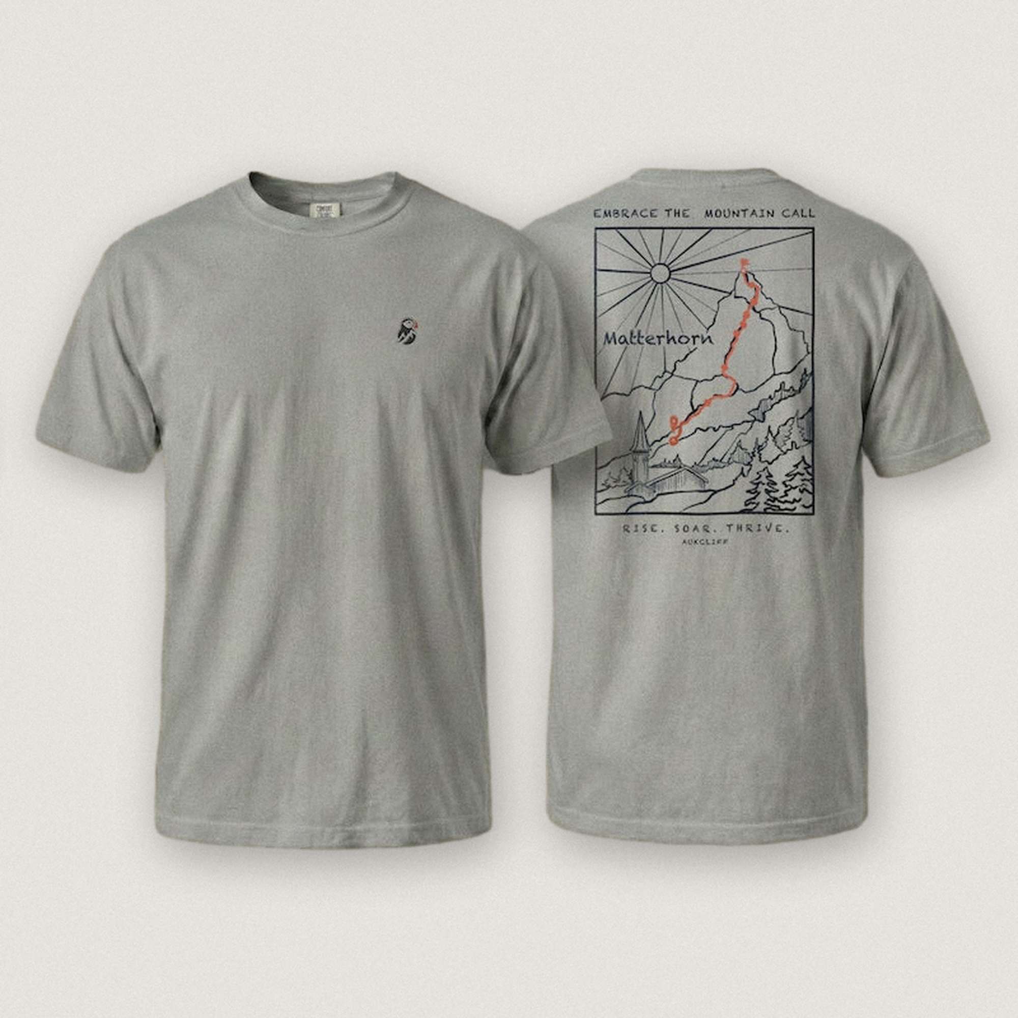 AukCliff Matterhorn tee in Grey, hand-drawn ridgeline line art across the back