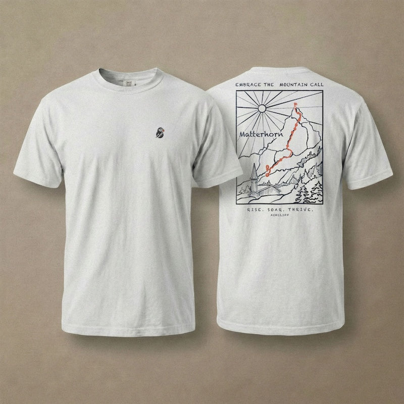 AukCliff Matterhorn tee in White, hand-drawn ridgeline line art across the back