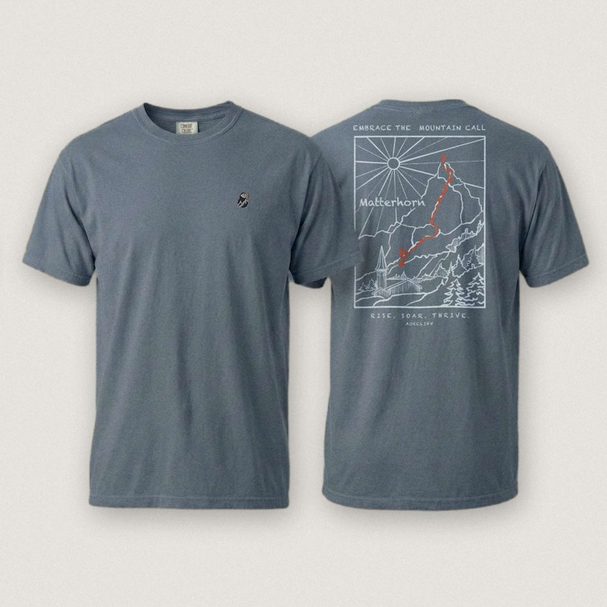 AukCliff Matterhorn tee in Blue Jean, ridgeline line art across the back