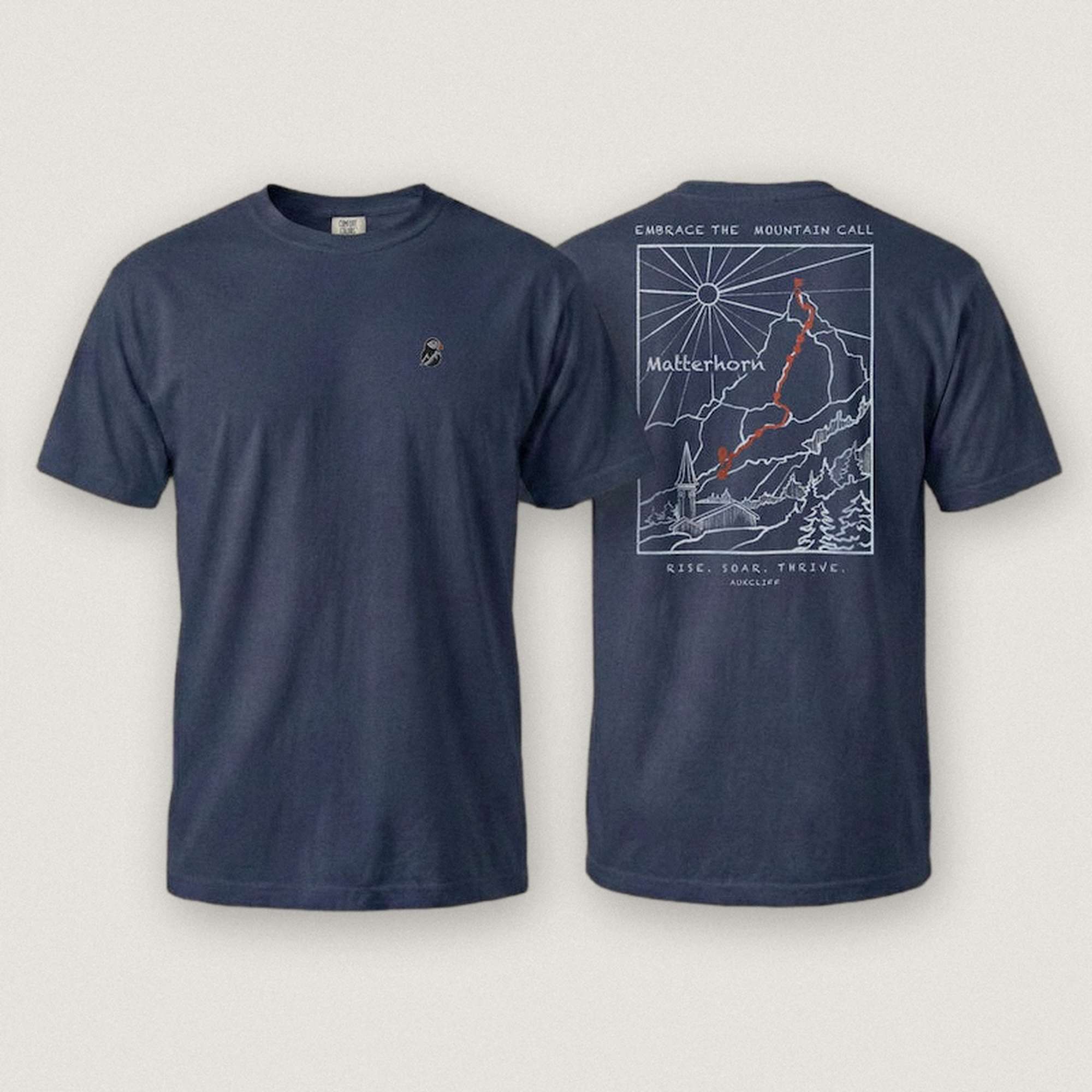AukCliff Matterhorn tee in True Navy, hand-drawn ridgeline line art across the back