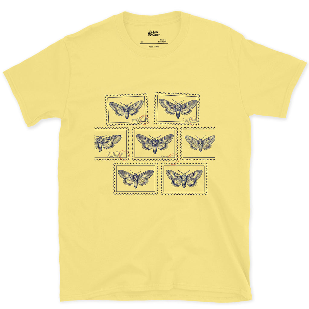 Seven Wild Moths, None of Them Named design on a Cornsilk Gildan Softstyle t-shirt