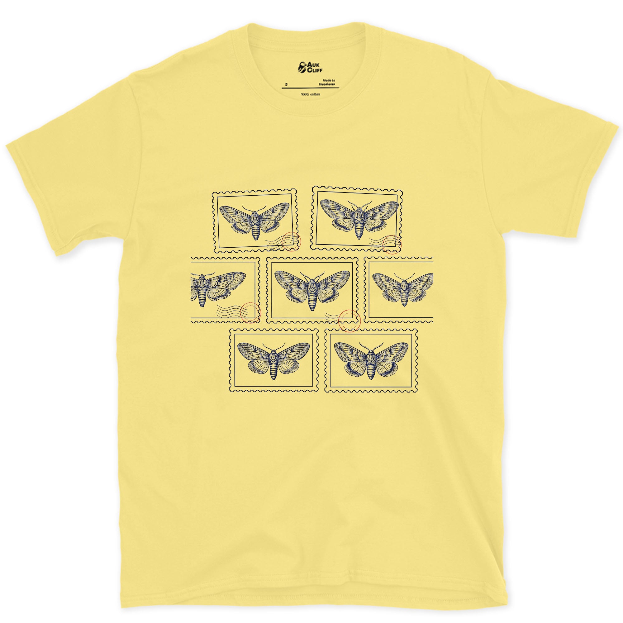 Seven Wild Moths, None of Them Named design on a Cornsilk Gildan Softstyle t-shirt