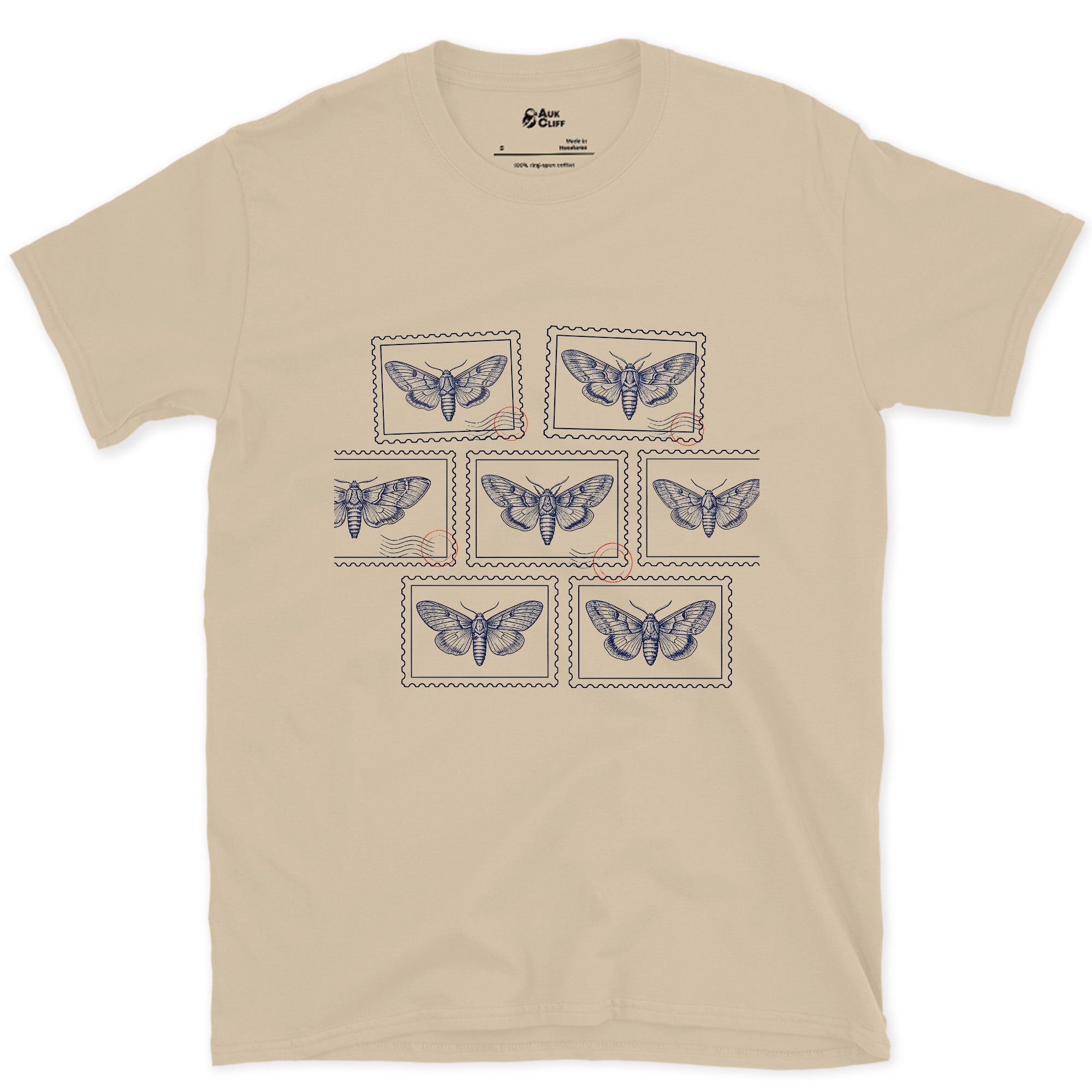 Seven Wild Moths, None of Them Named design on a Sand Gildan Softstyle t-shirt