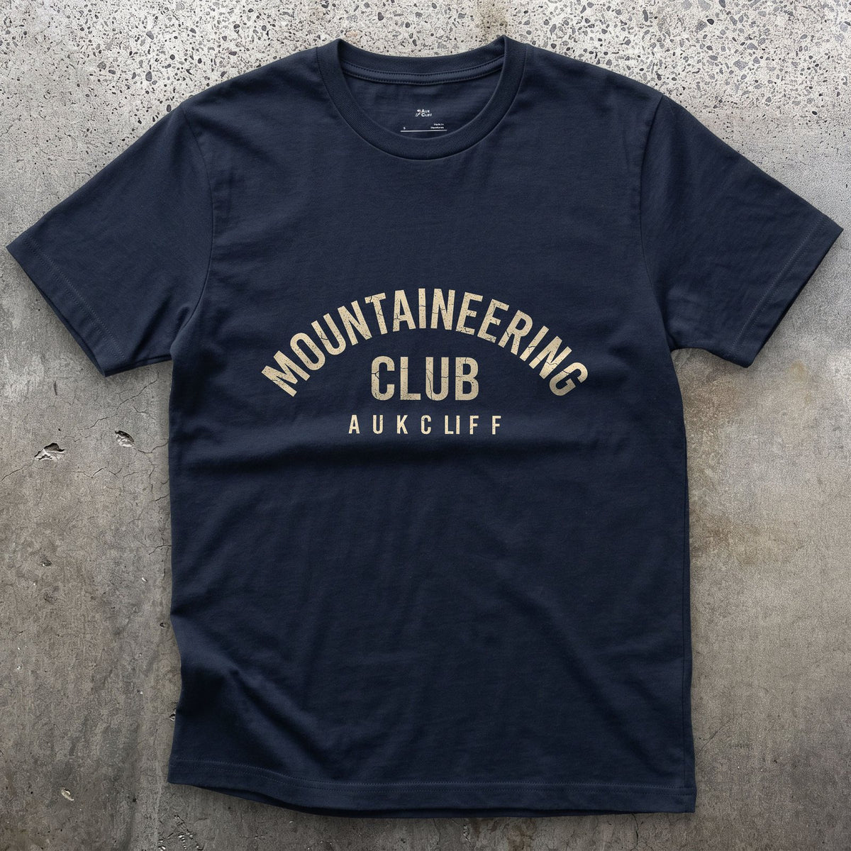 Mountaineering Club Arch design on a Navy Gildan Softstyle t-shirt