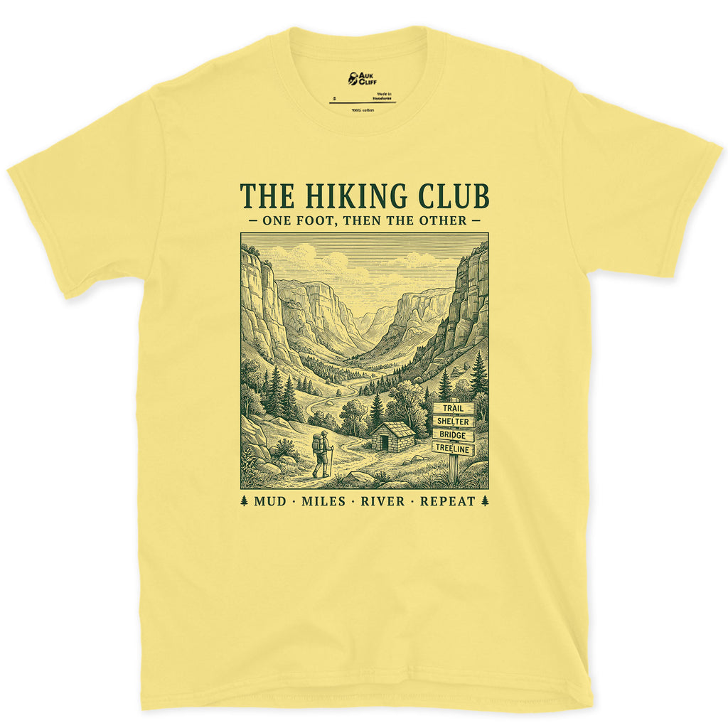 Mud, Miles, River, Repeat, Hiking Club design on a Cornsilk Gildan Softstyle t-shirt