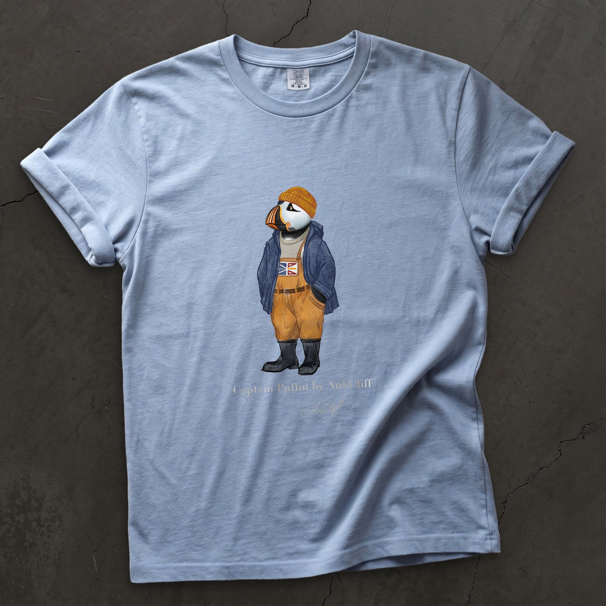 Captain Puffin Newfoundland & Labrador on a Washed Denim Comfort Colors t-shirt