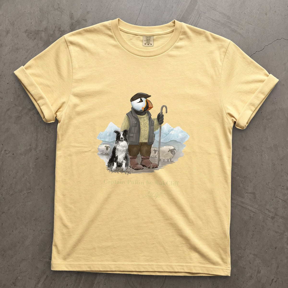 Captain Puffin The Merino Farmer on a Butter Comfort Colors t-shirt