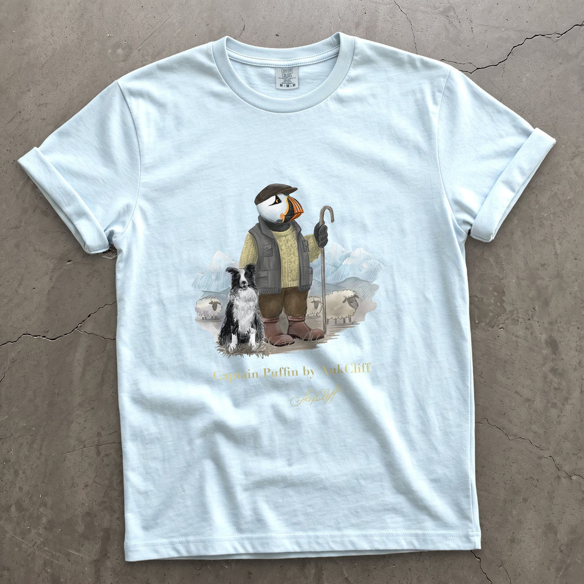 Captain Puffin The Merino Farmer on a Chambray Comfort Colors t-shirt