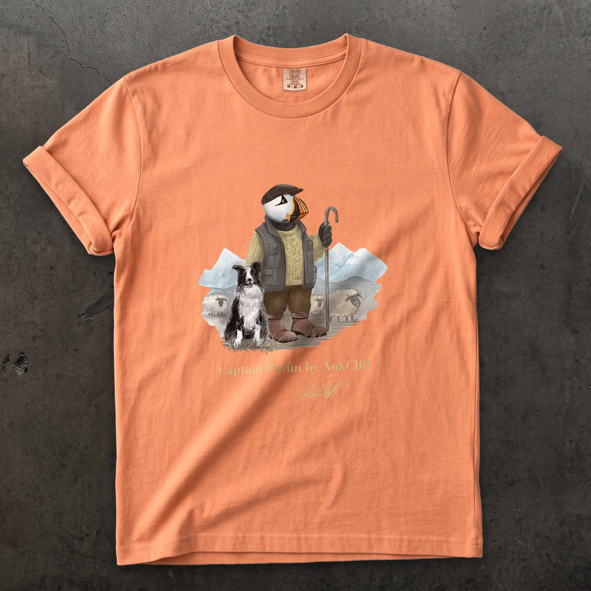 Captain Puffin The Merino Farmer on a Terracotta Comfort Colors t-shirt