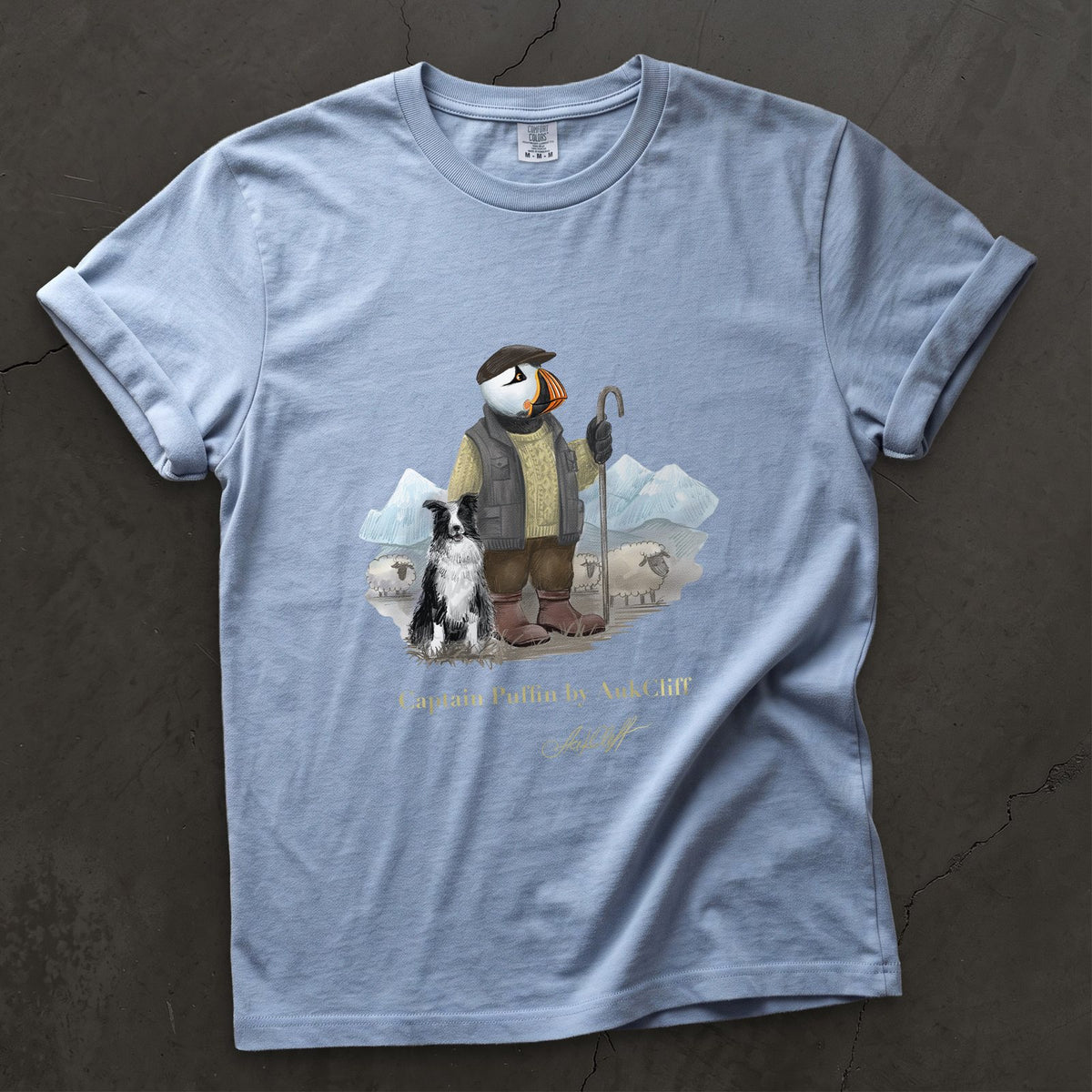 Captain Puffin The Merino Farmer on a Washed Denim Comfort Colors t-shirt