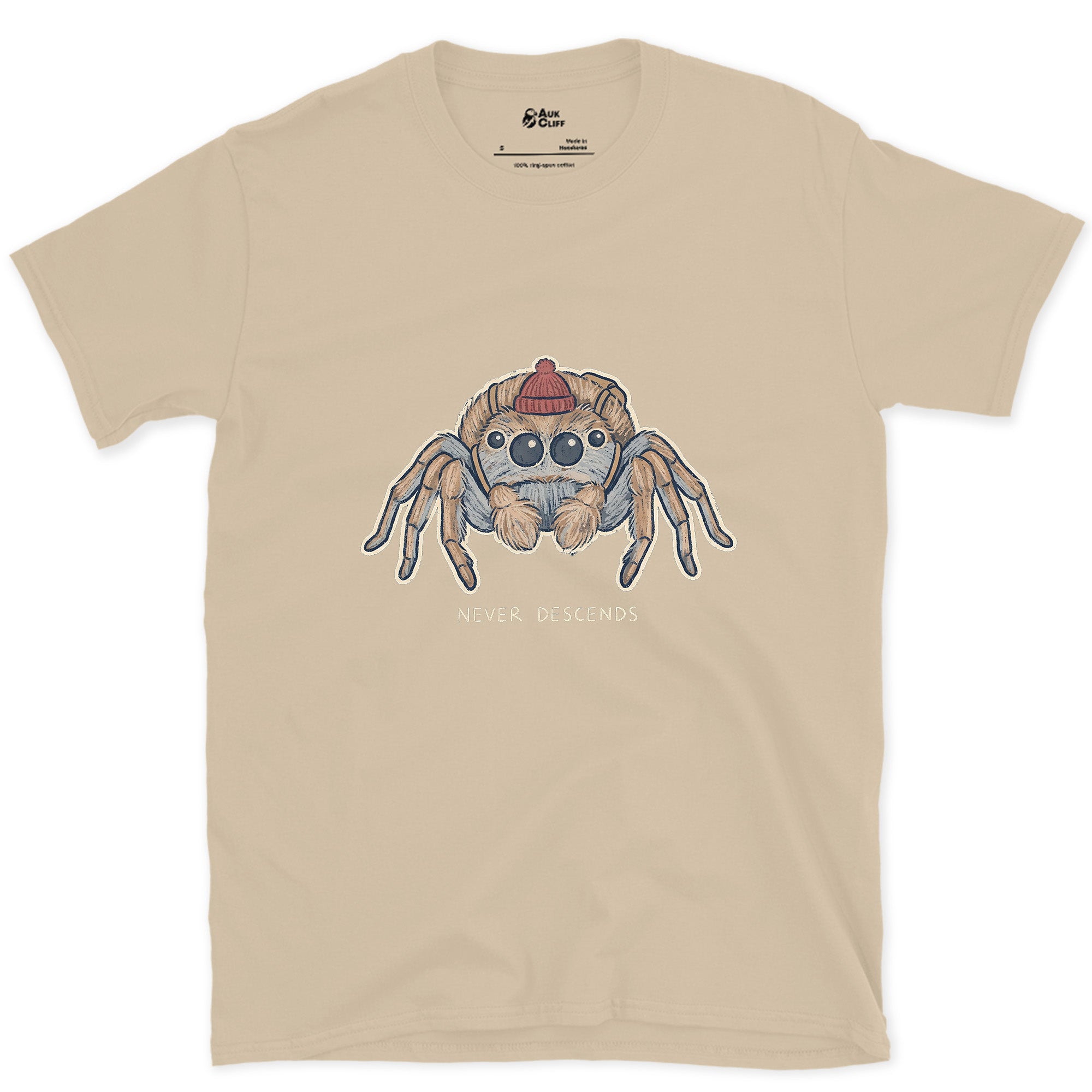 Spider, Climbs but Never Descends design on a Sand Gildan Softstyle t-shirt