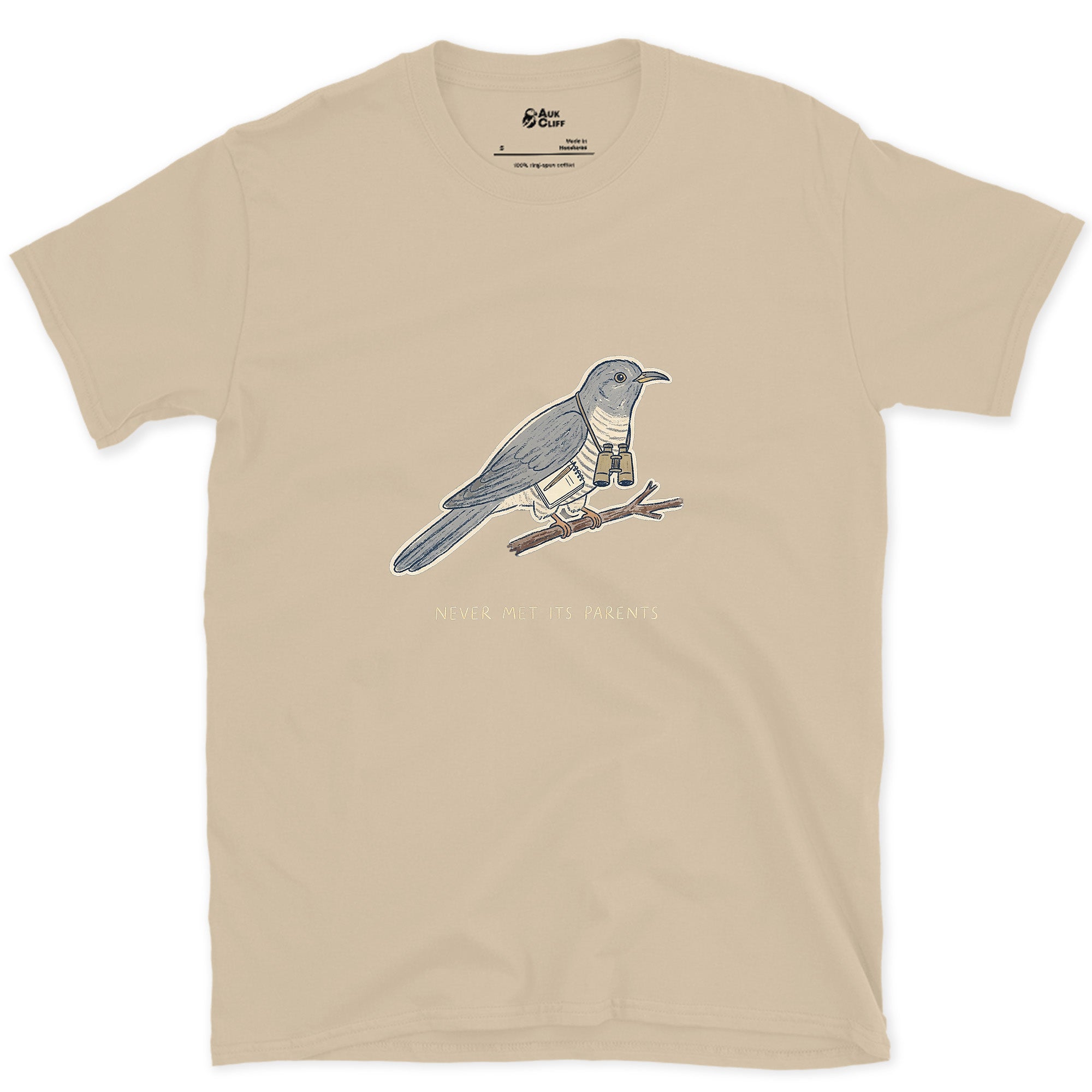 Never Met Its Parents, Cuckoo design on a Sand Gildan Softstyle t-shirt