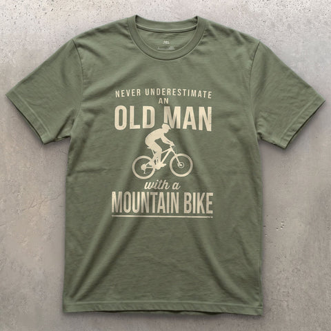 Never Underestimate an Old Man With a Mountain Bike design on a Military Green Gildan Softstyle t-shirt