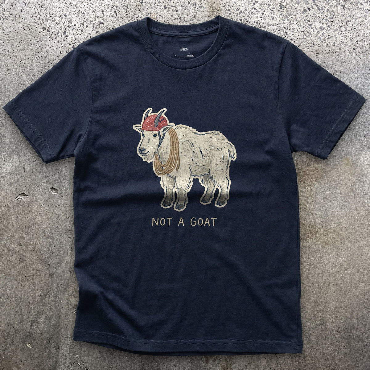 Not a Goat, Mountain Goat design on a Navy Gildan Softstyle t-shirt