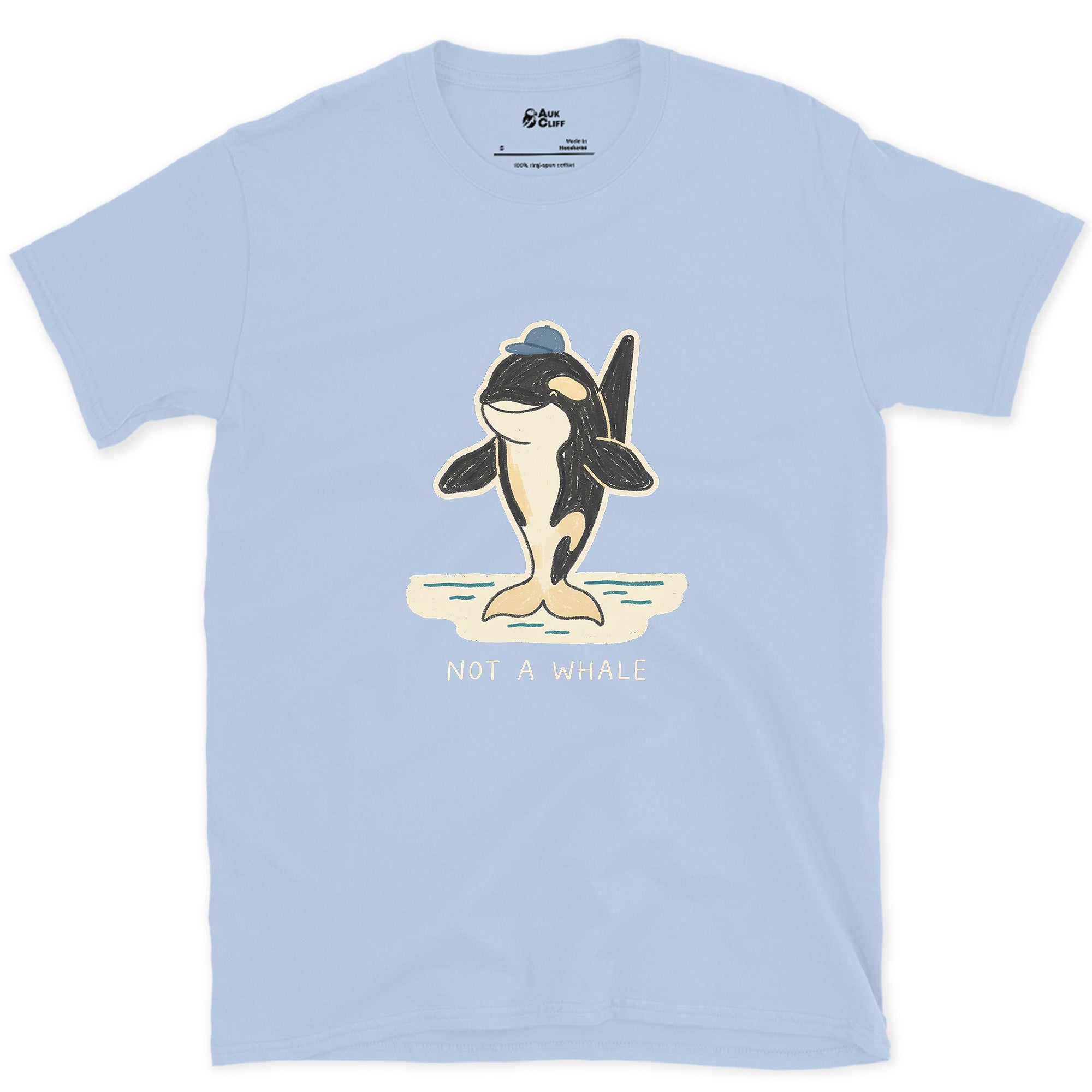 Not a Whale, Orca in a Cap design on a Light Blue Gildan Softstyle t-shirt