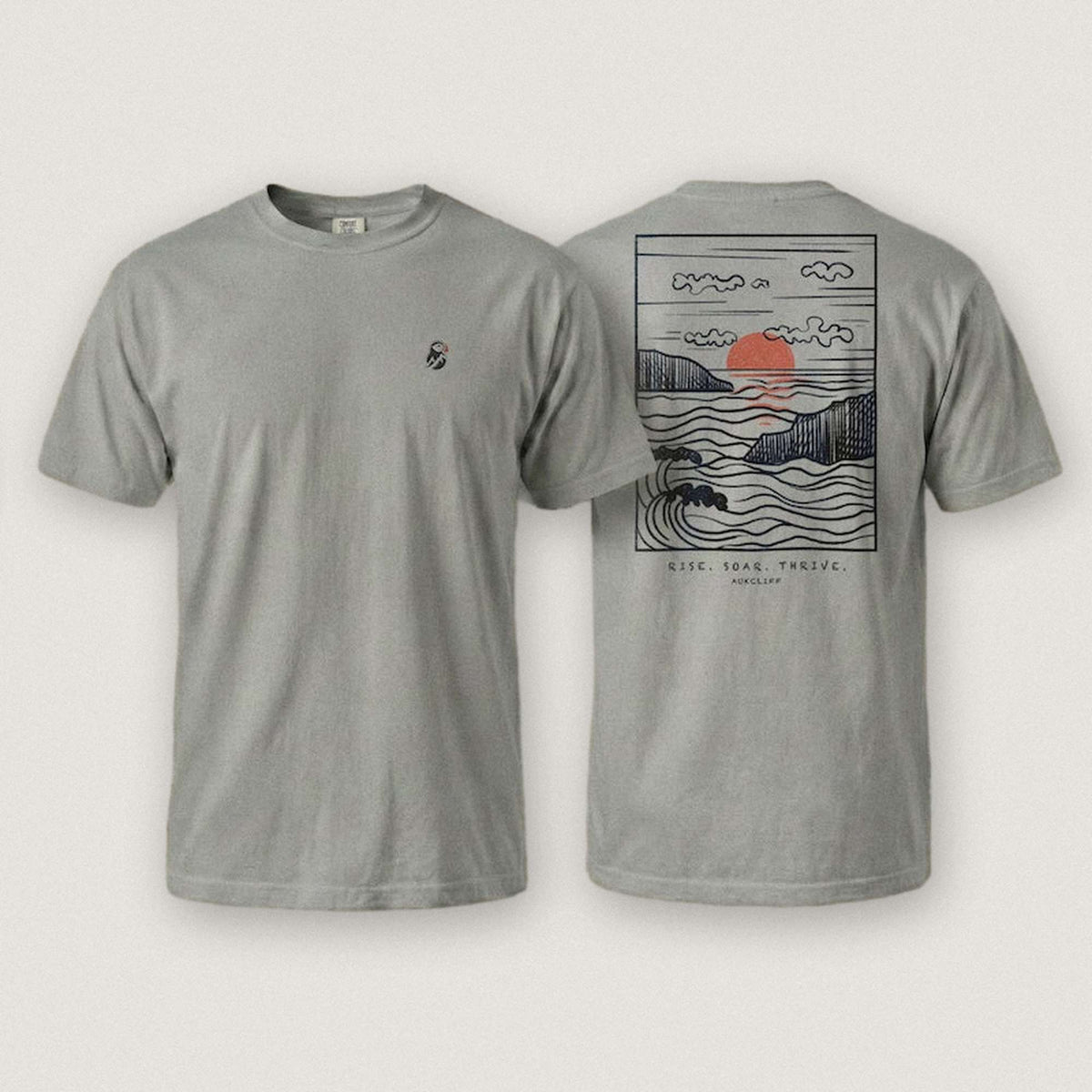 AukCliff Ocean Sunset Waves tee in Grey, sunset and waves line art across the back