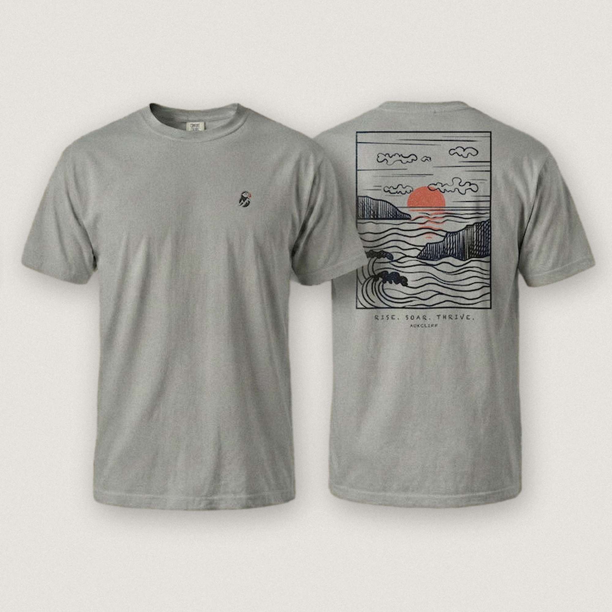 AukCliff Ocean Sunset Waves tee in Grey, hand-drawn sunset and waves line art across the back