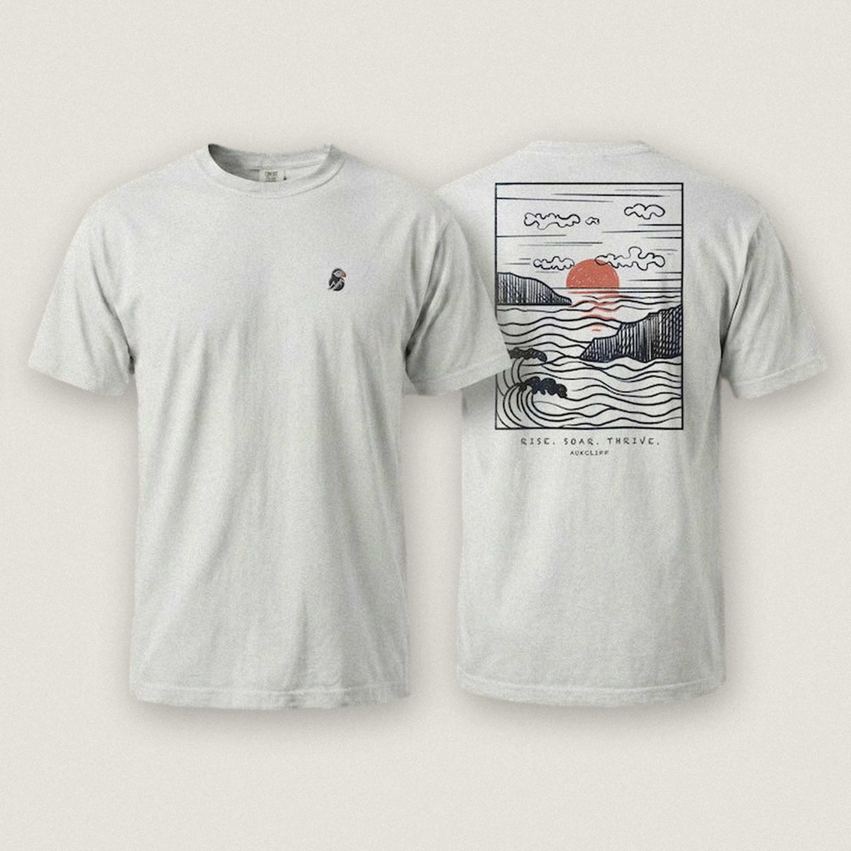 AukCliff Ocean Sunset Waves tee in White, sunset and waves line art across the back