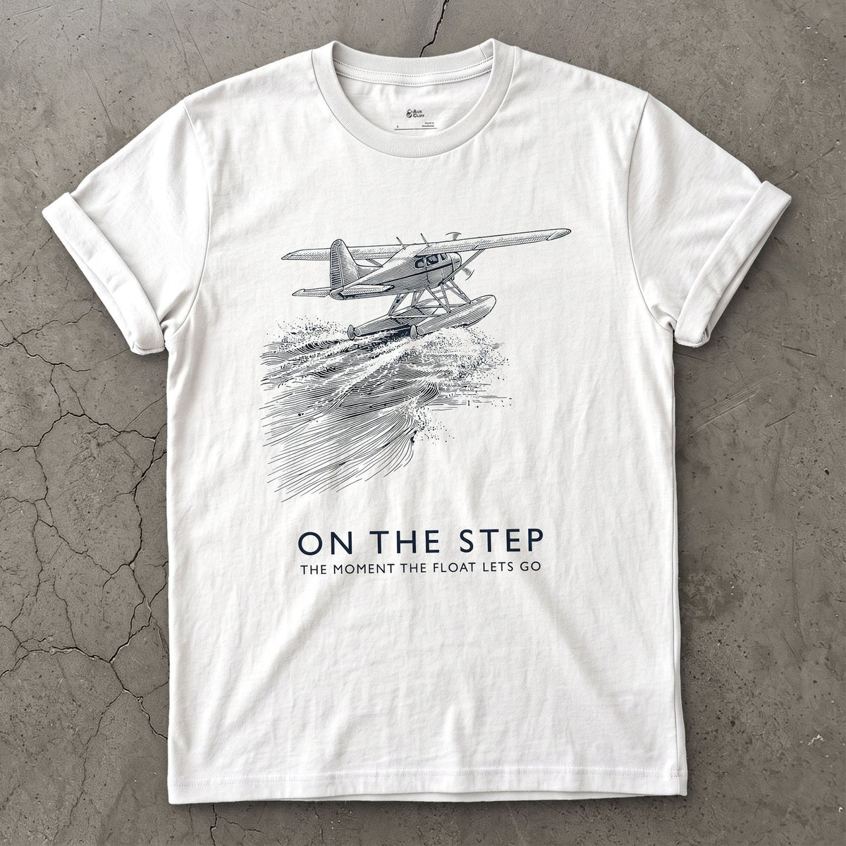 On the Step, the Float Lets Go design on a White Gildan Softstyle t-shirt