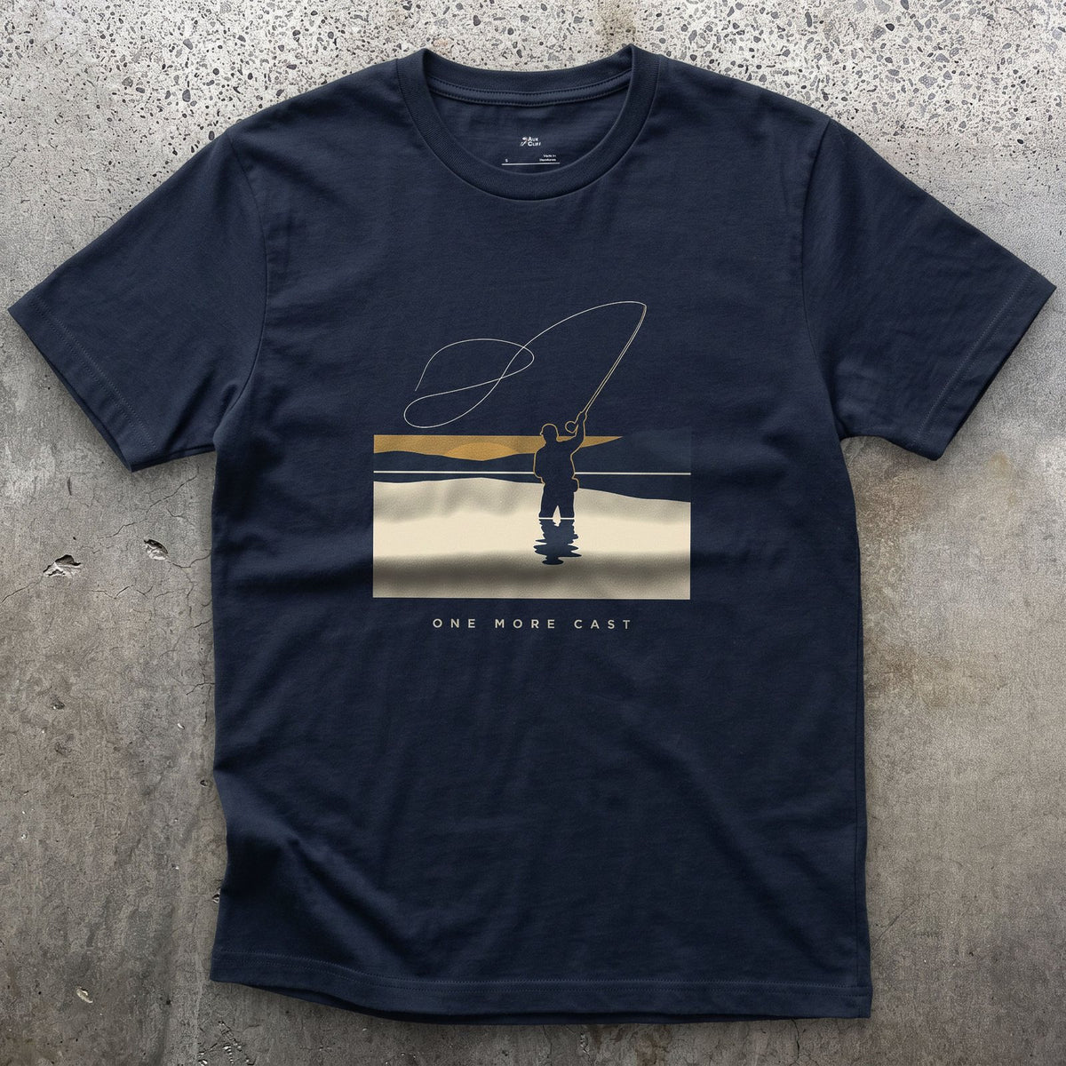 One More Cast, Angler at Sunset design on a Navy Gildan Softstyle t-shirt