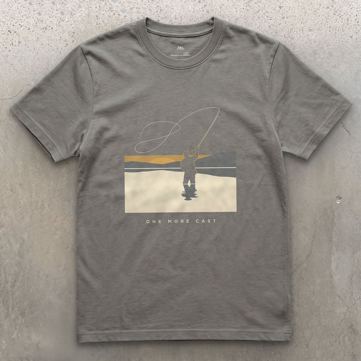 One More Cast, Angler at Sunset design on a Charcoal Gildan Softstyle t-shirt