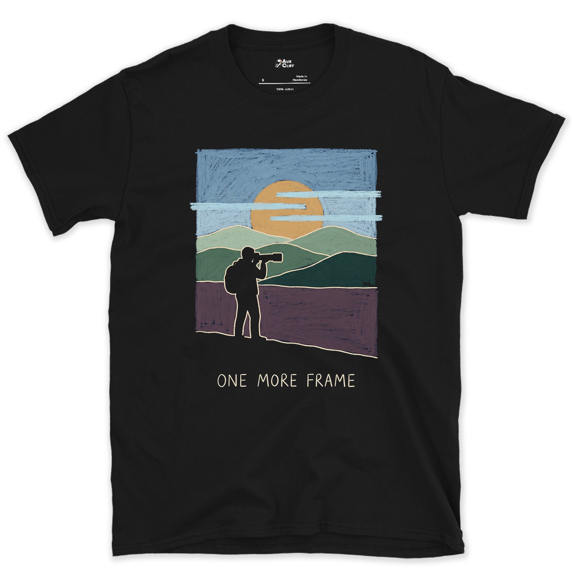 One More Frame, Photographer on the Hillside design on a Black Gildan Softstyle t-shirt