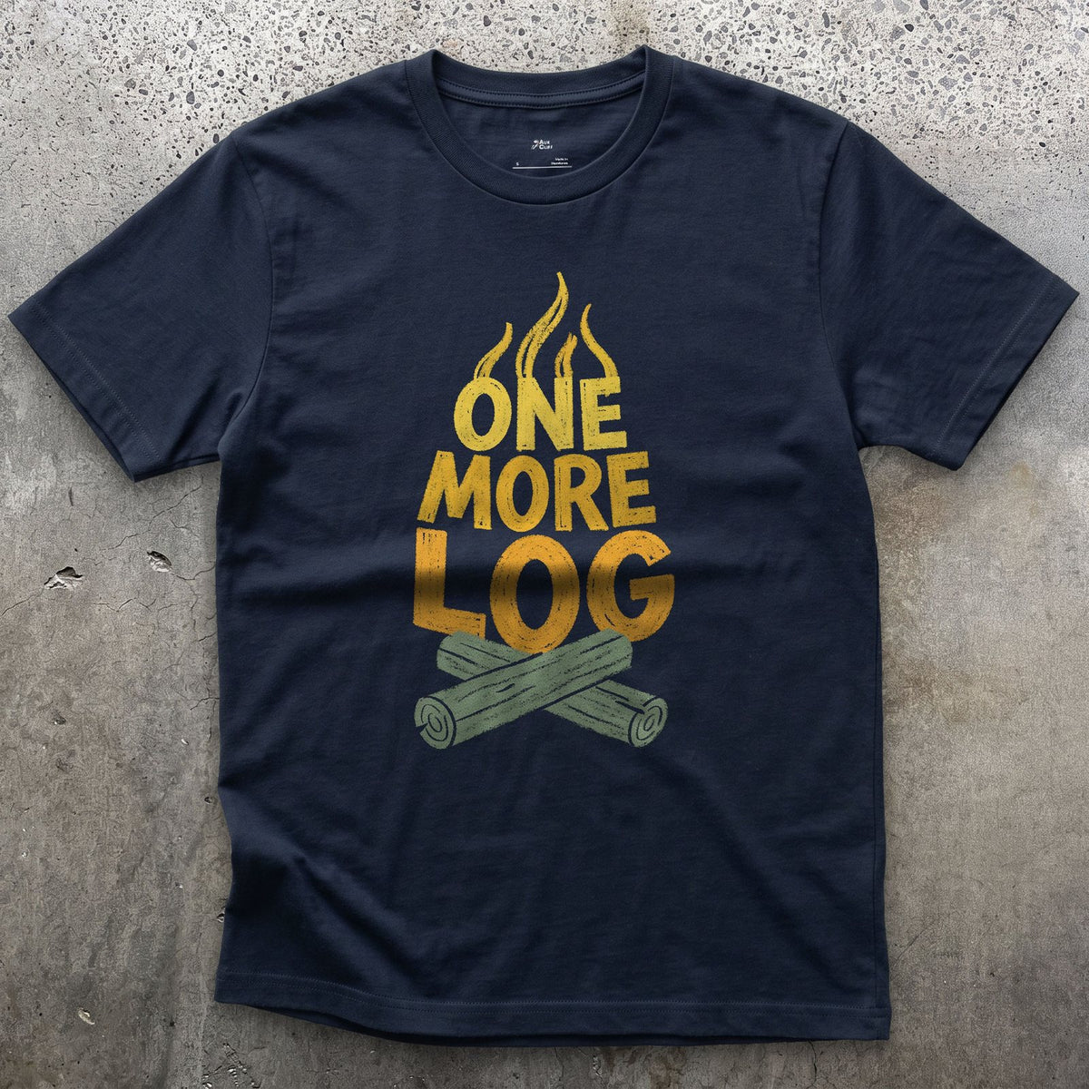 One More Log for the Camp Fire design on a Navy Gildan Softstyle t-shirt