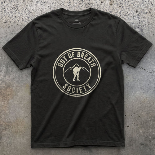 Out of Breath Hiking Society Crest Badge design on a Black Gildan Softstyle t-shirt