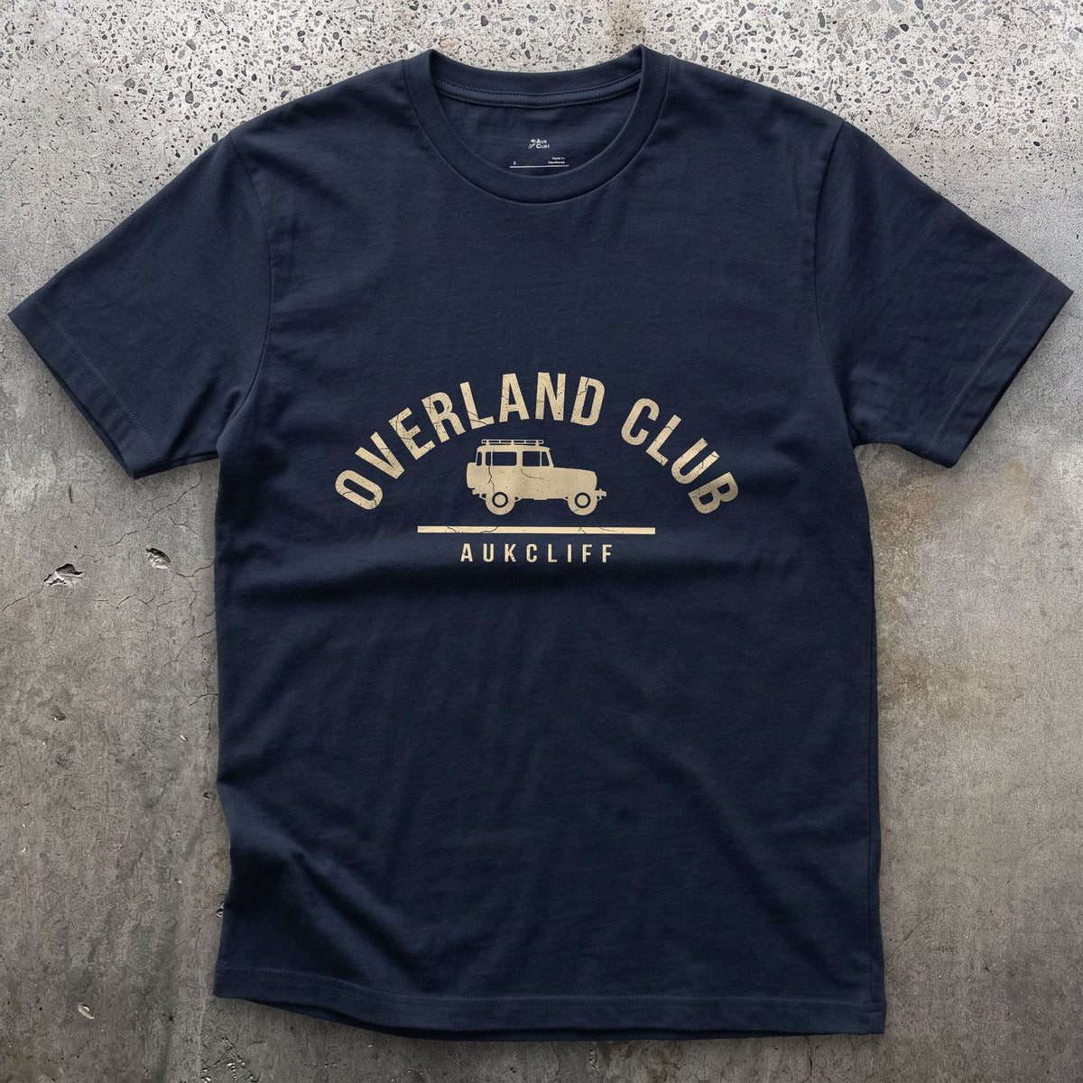 Overland Club Arch Badge, Wagon at the Centre design on a Navy Gildan Softstyle t-shirt