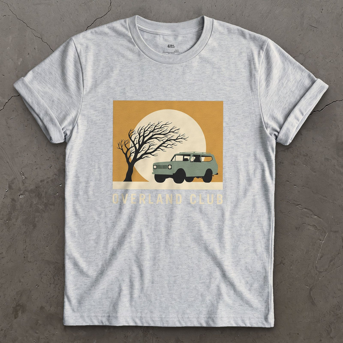 Overland Club, Bare Tree Under a Full Moon design on a Sport Grey Gildan Softstyle t-shirt