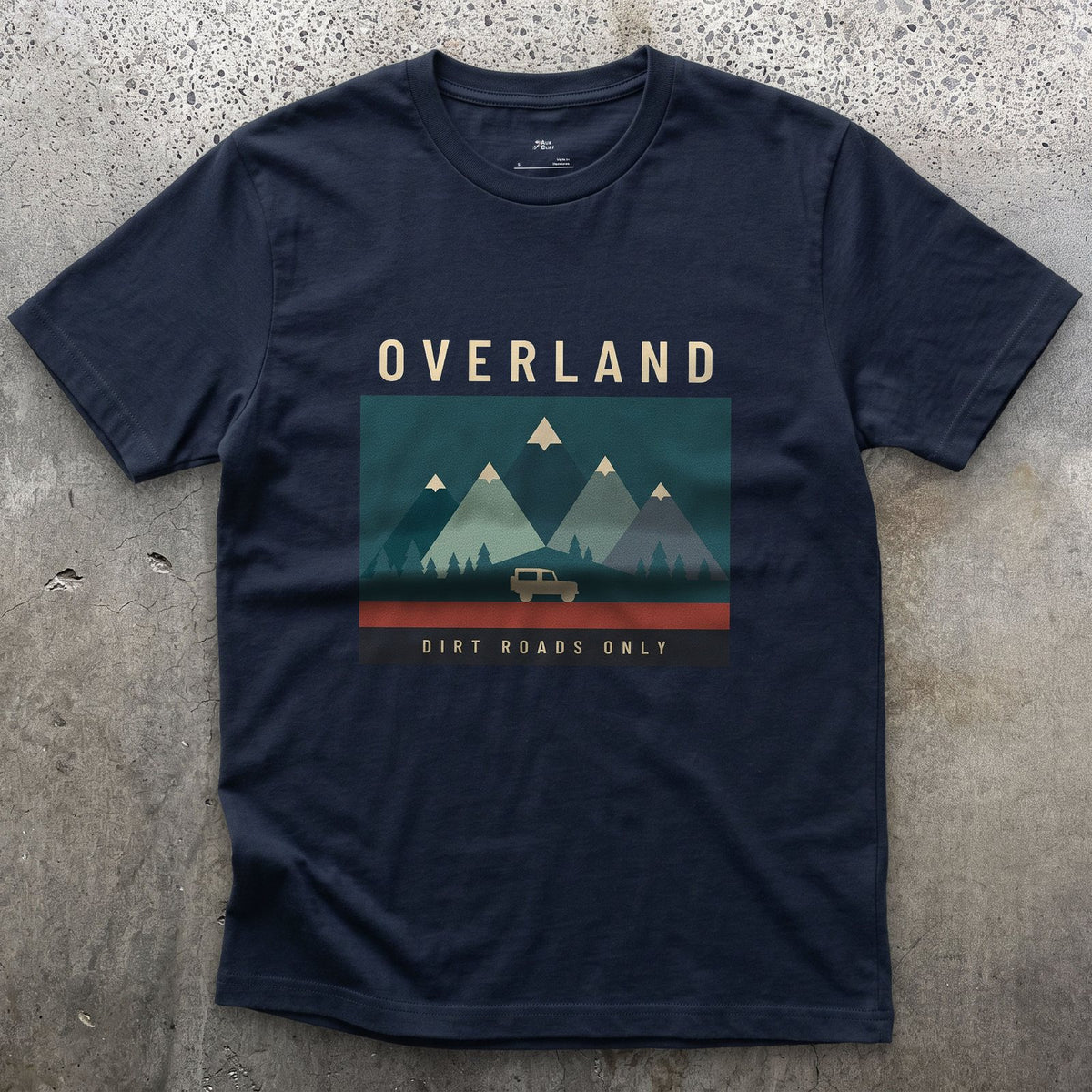 Dirt Roads Only, Small Wagon Between the Peaks design on a Navy Gildan Softstyle t-shirt