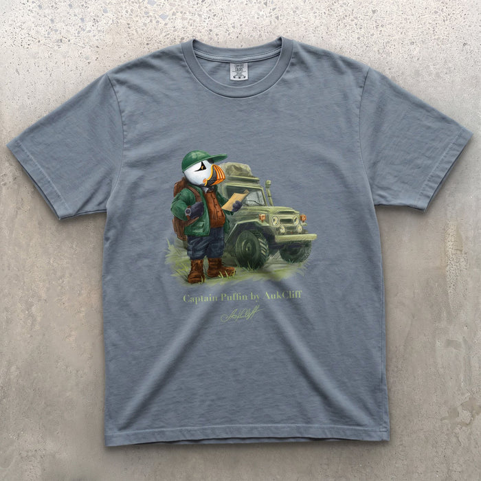 Captain Puffin Overland Explorer on a Blue Jean Comfort Colors t-shirt