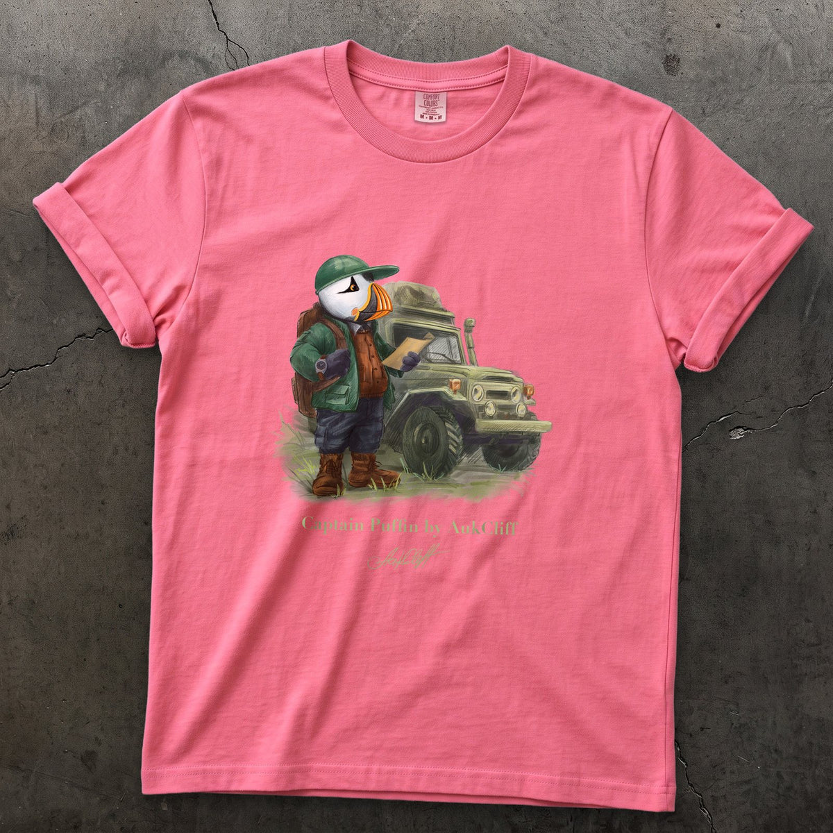 Captain Puffin Overland Explorer on a Crunchberry Comfort Colors t-shirt
