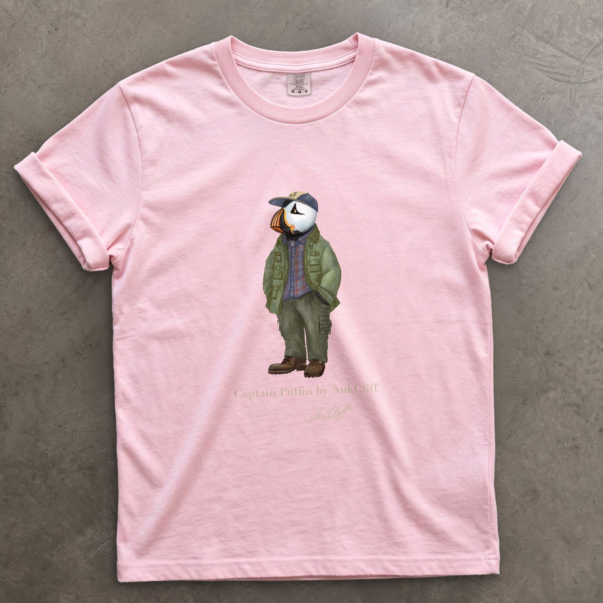 Captain Puffin Pacific Northwest Trailkeeper on a Blossom Comfort Colors t-shirt