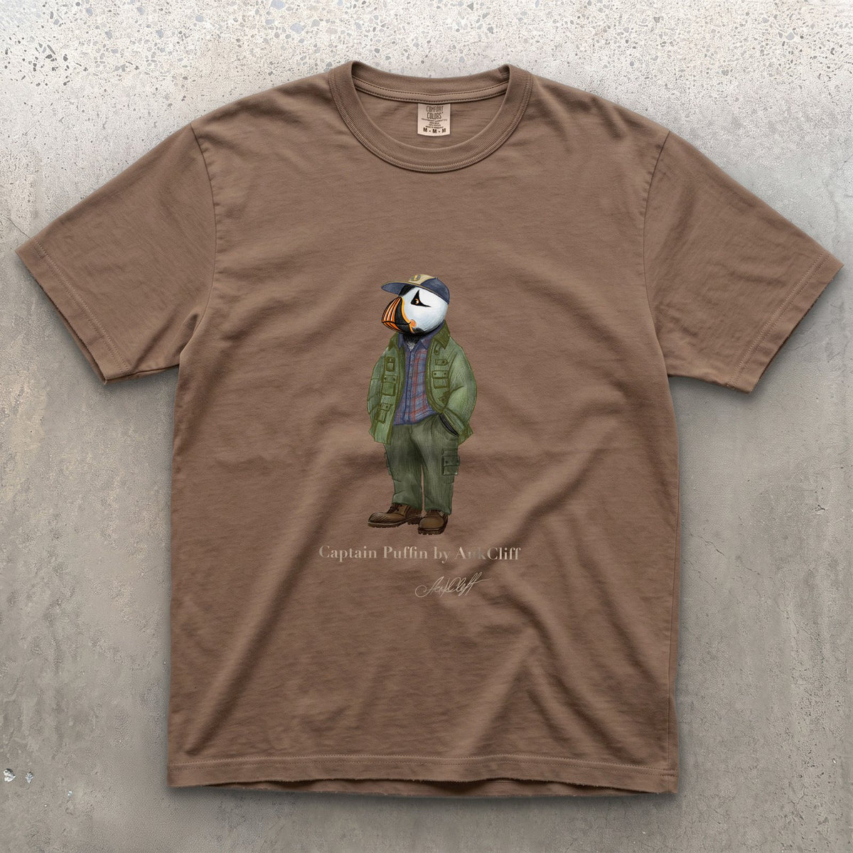 Captain Puffin Pacific Northwest Trailkeeper on a Espresso Comfort Colors t-shirt