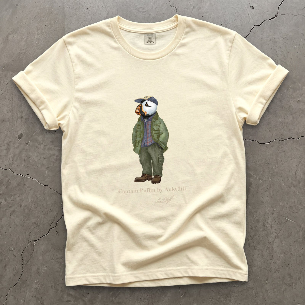 Captain Puffin Pacific Northwest Trailkeeper on a Ivory Comfort Colors t-shirt