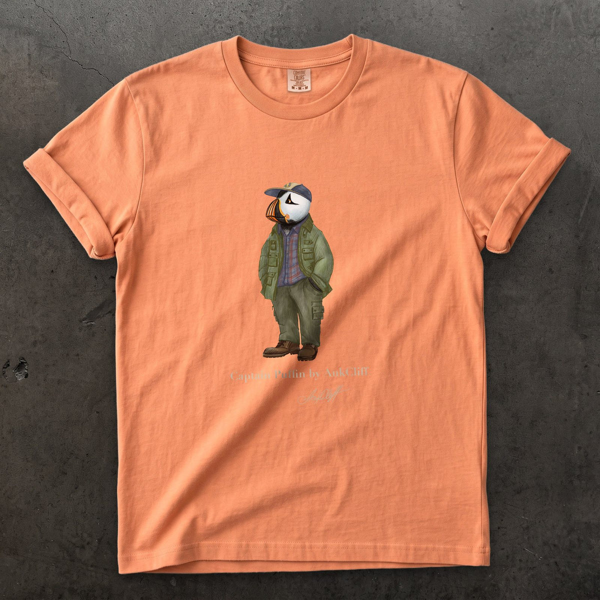 Captain Puffin Pacific Northwest Trailkeeper on a Terracotta Comfort Colors t-shirt