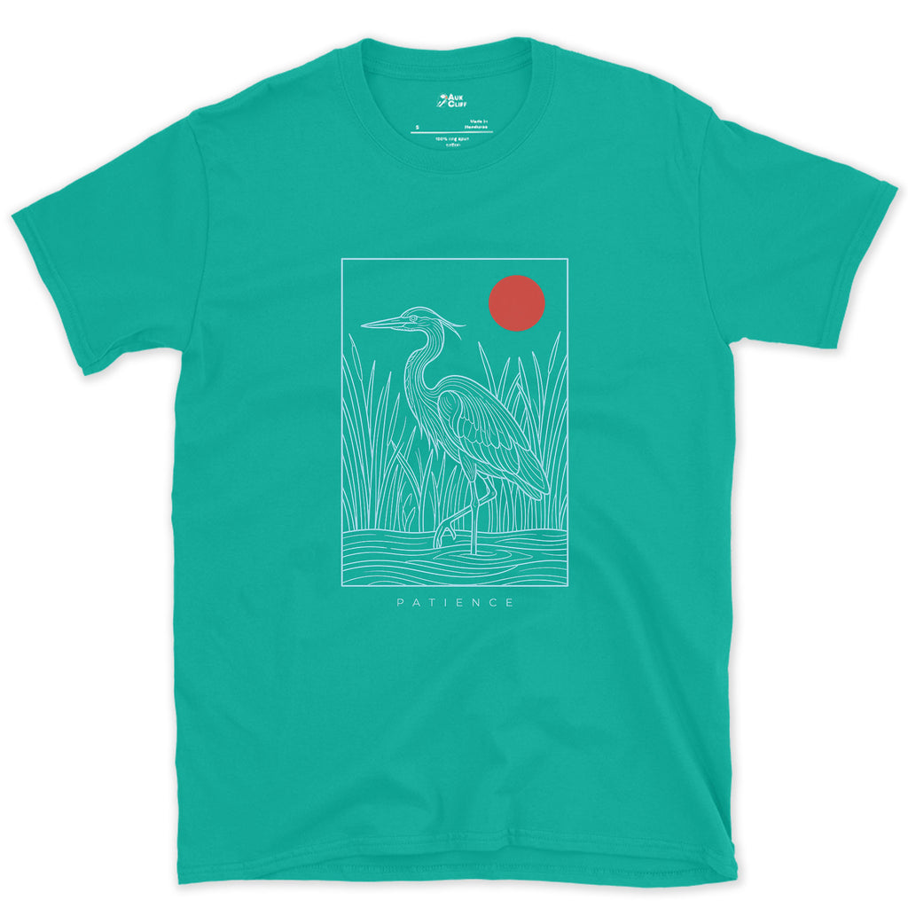 Patience, Heron in the Reeds Under a Red Sun design on a Jade Dome Gildan Softstyle t-shirt