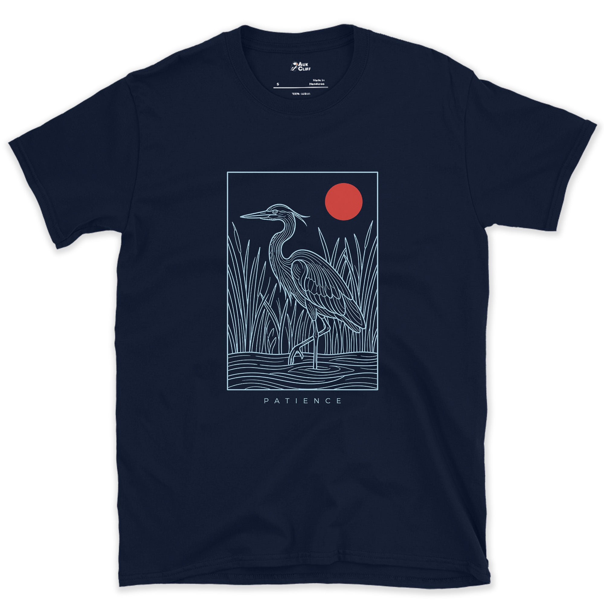 Patience, Heron in the Reeds Under a Red Sun design on a Navy Gildan Softstyle t-shirt