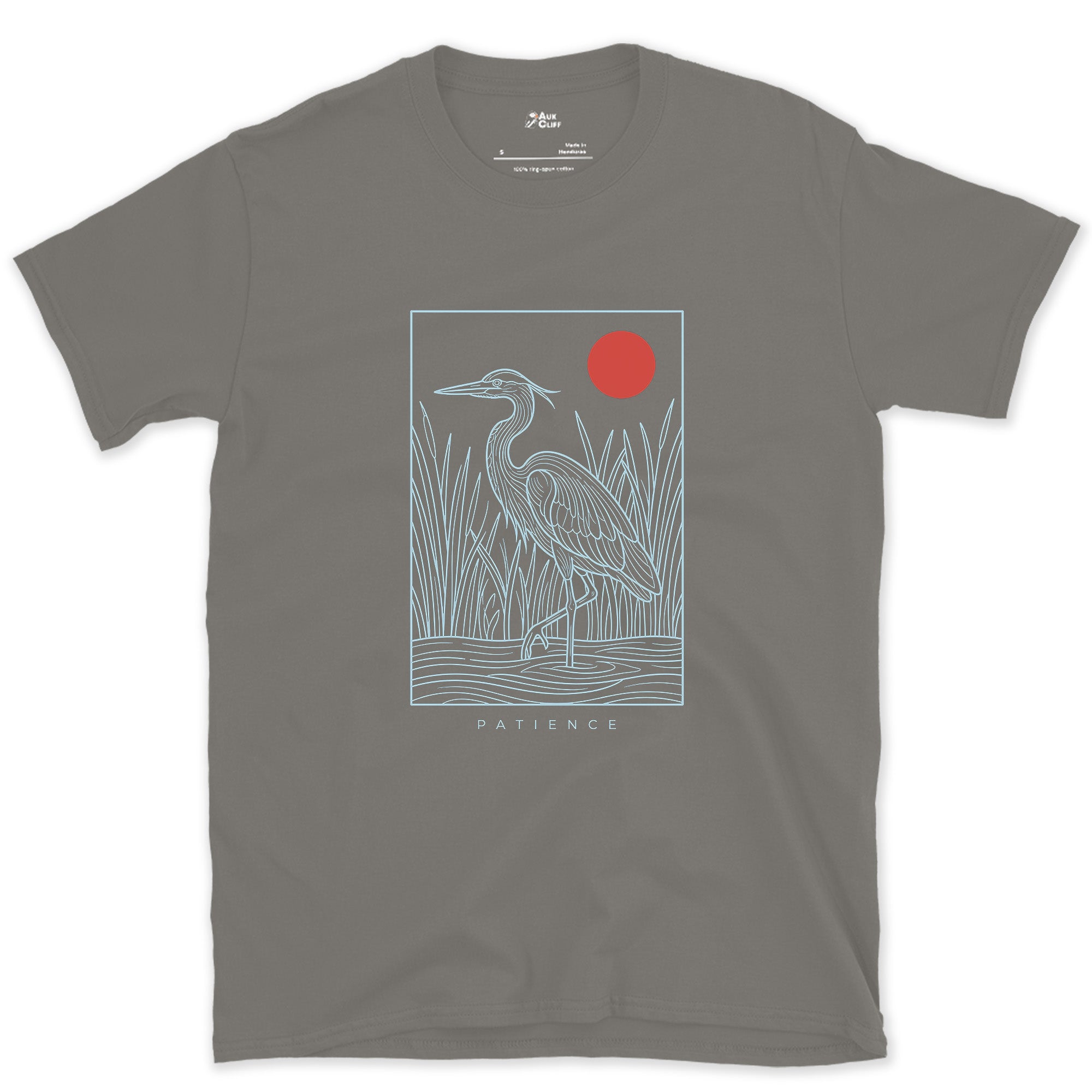 Patience, Heron in the Reeds Under a Red Sun design on a Charcoal Gildan Softstyle t-shirt