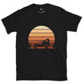 Sunset Filling the Circle Behind the Truck design on a Black Gildan Softstyle t-shirt