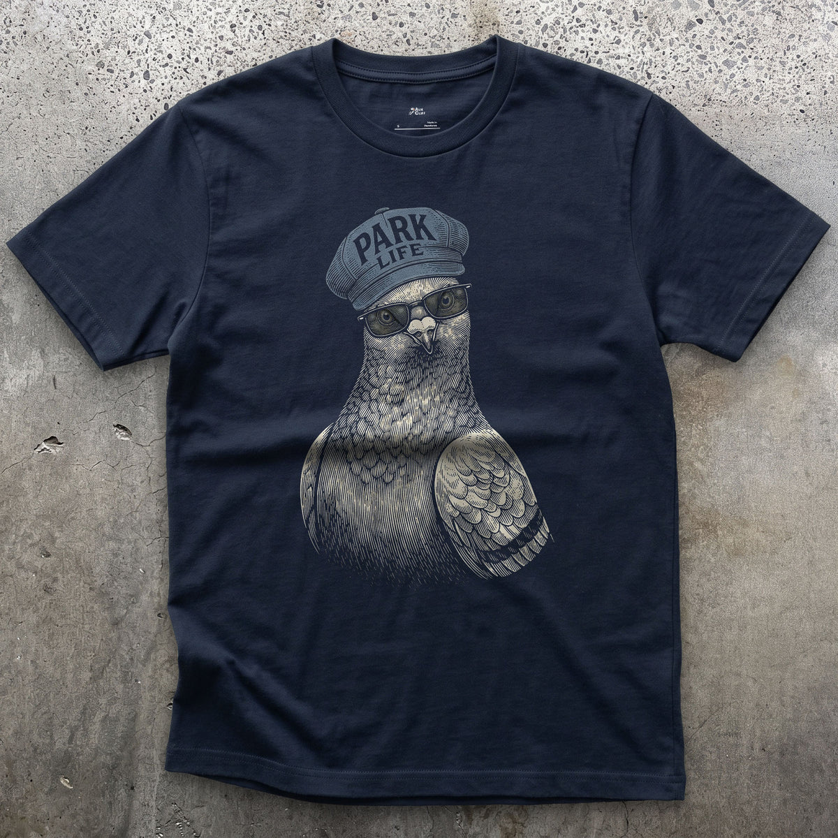 Park Life, Feral Pigeon on the Road design on a Navy Gildan Softstyle t-shirt