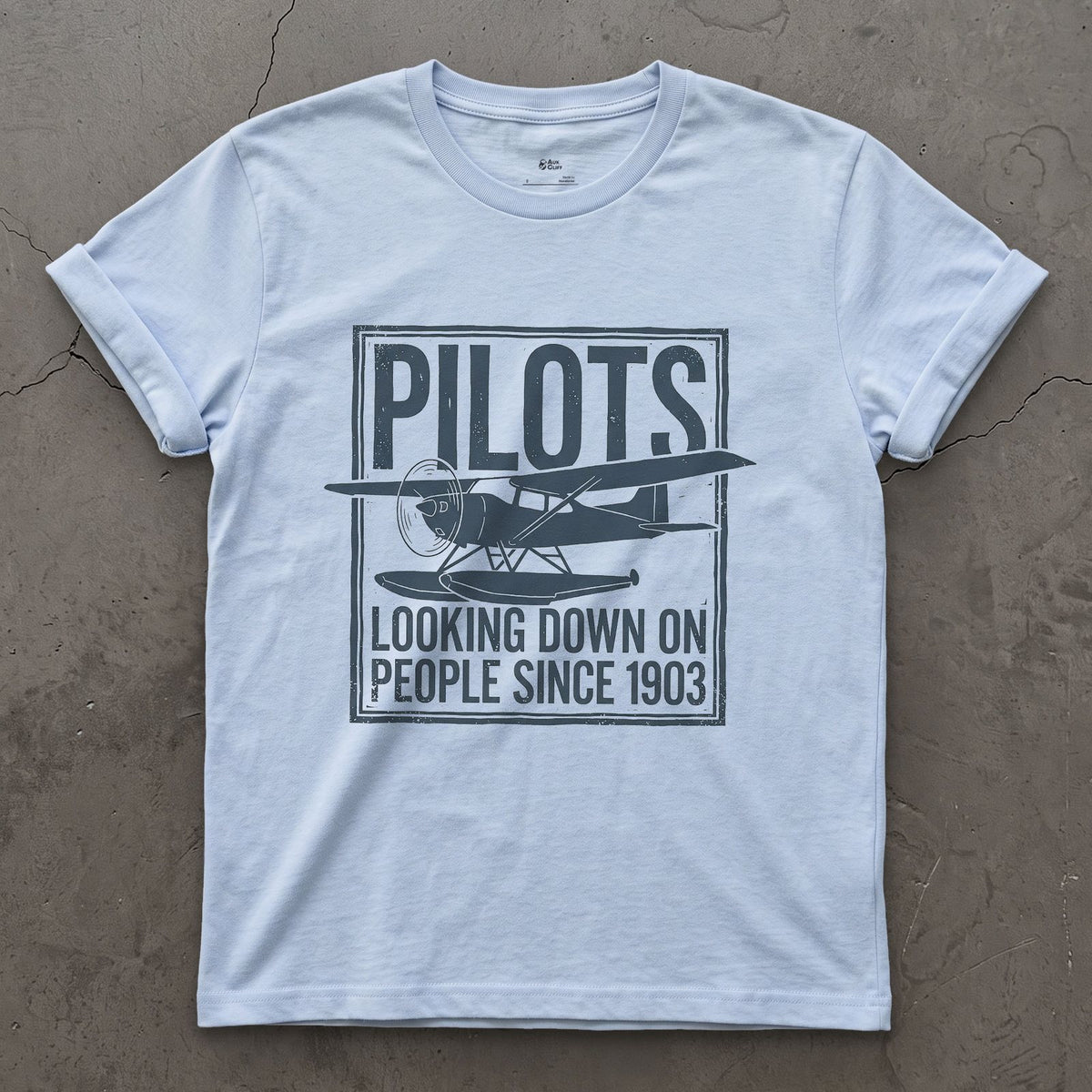 Pilots Looking Down Since 1903 design on a Light Blue Gildan Softstyle t-shirt