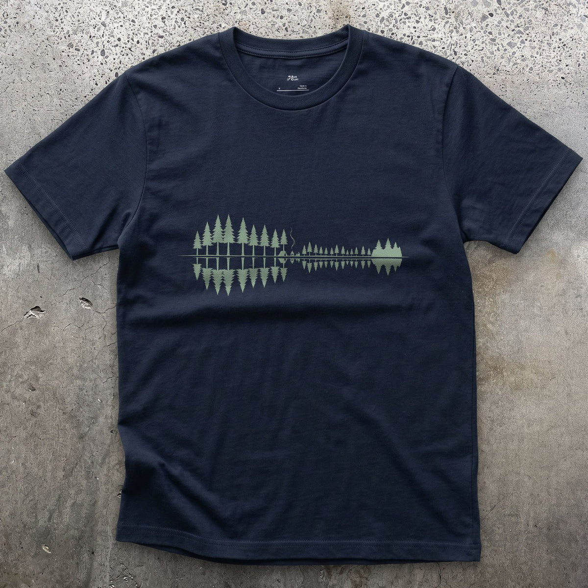 Something Passing Through the Pines design on a Navy Gildan Softstyle t-shirt
