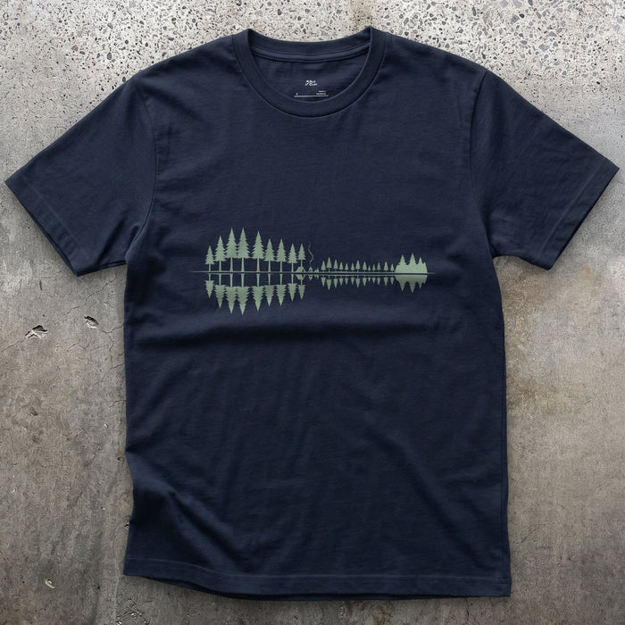 Something Passing Through the Pines design on a Navy Gildan Softstyle t-shirt
